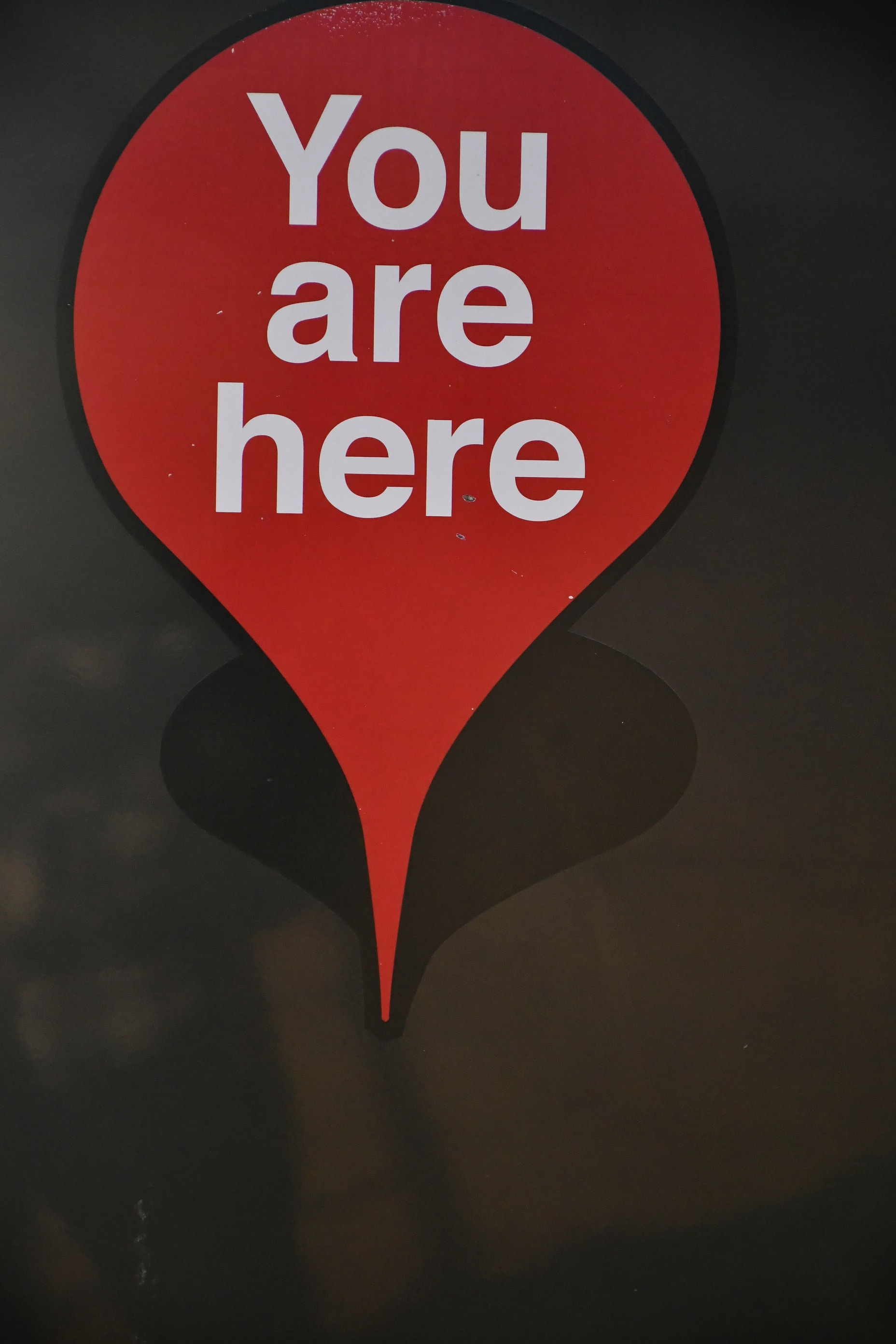 red map pin says "you are here"